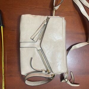 Bueno Cream Crossbody Bag with Tassels